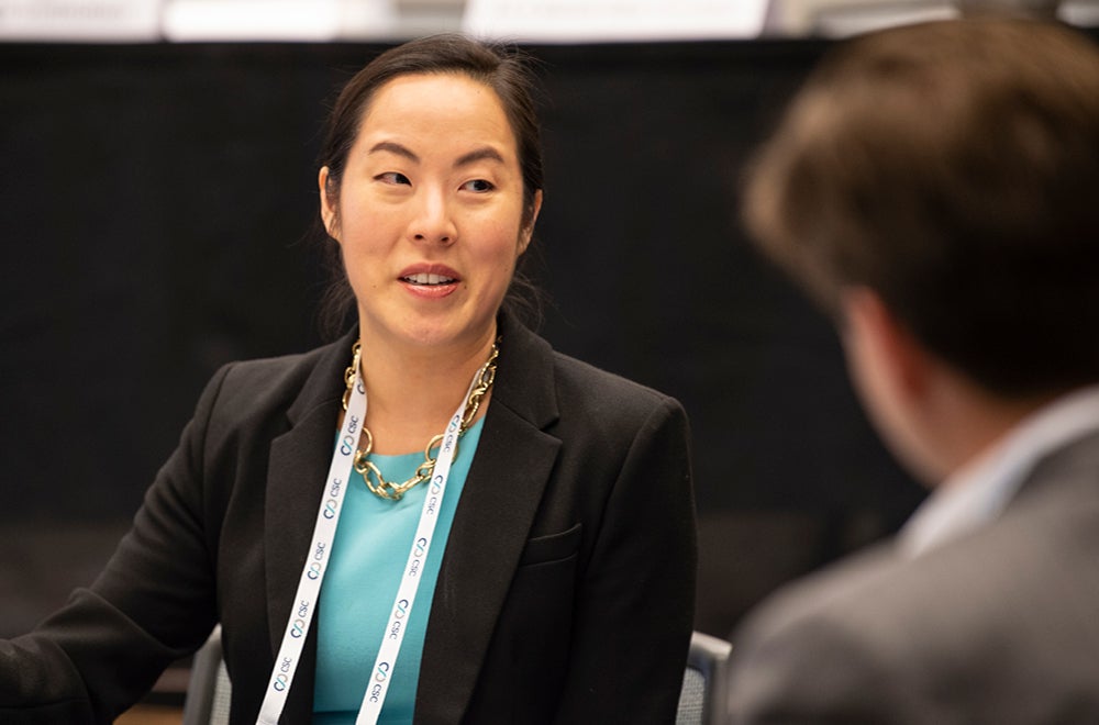 women of Asian decent in business attire 